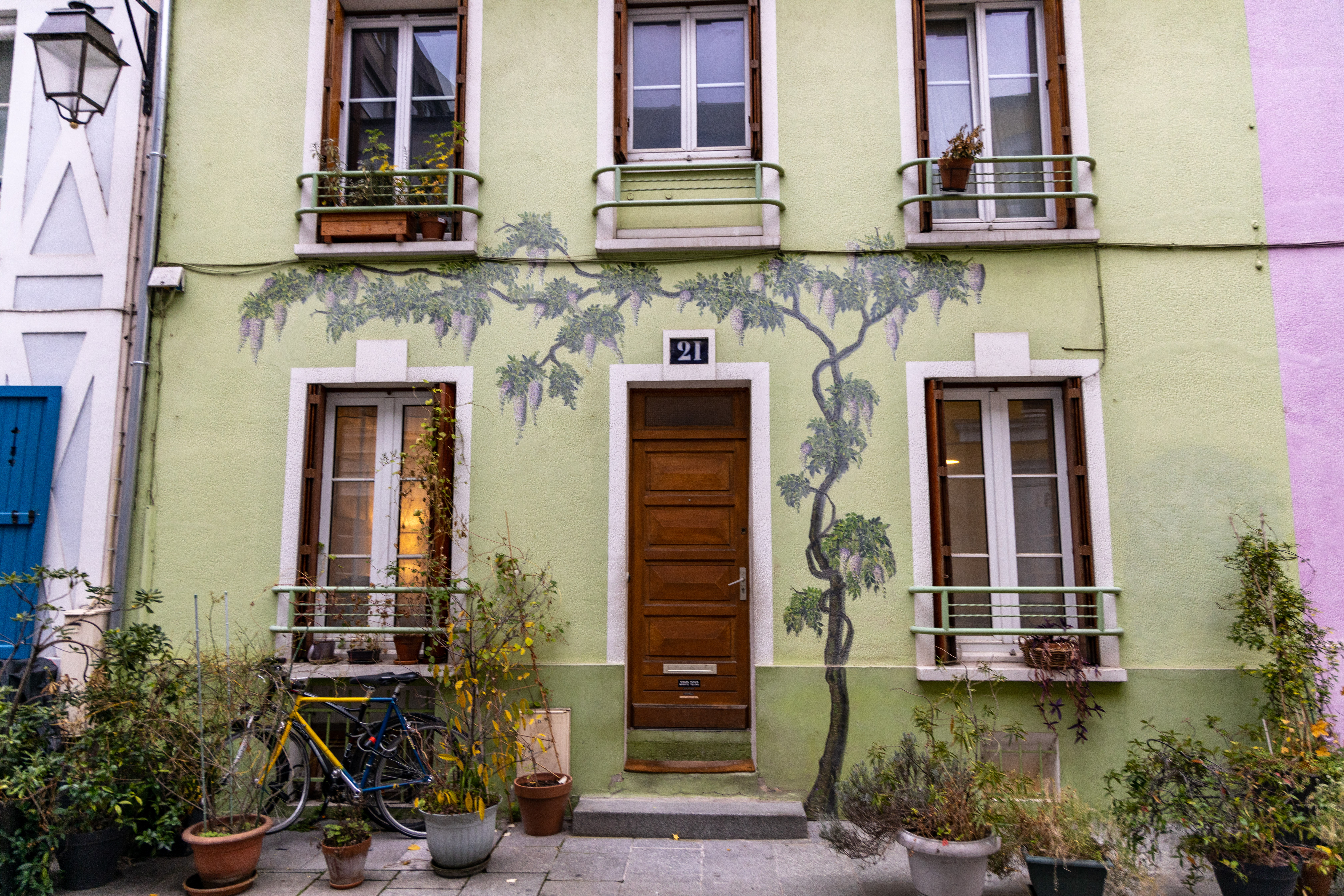 A colorful house in a normally busy street, with no one in sight.