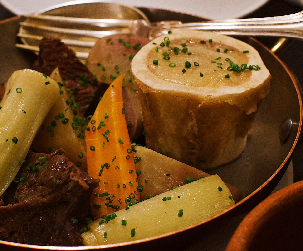 Boeuf bourguignon is a typical Parisian dish. Here it is served with its sauce on the side.