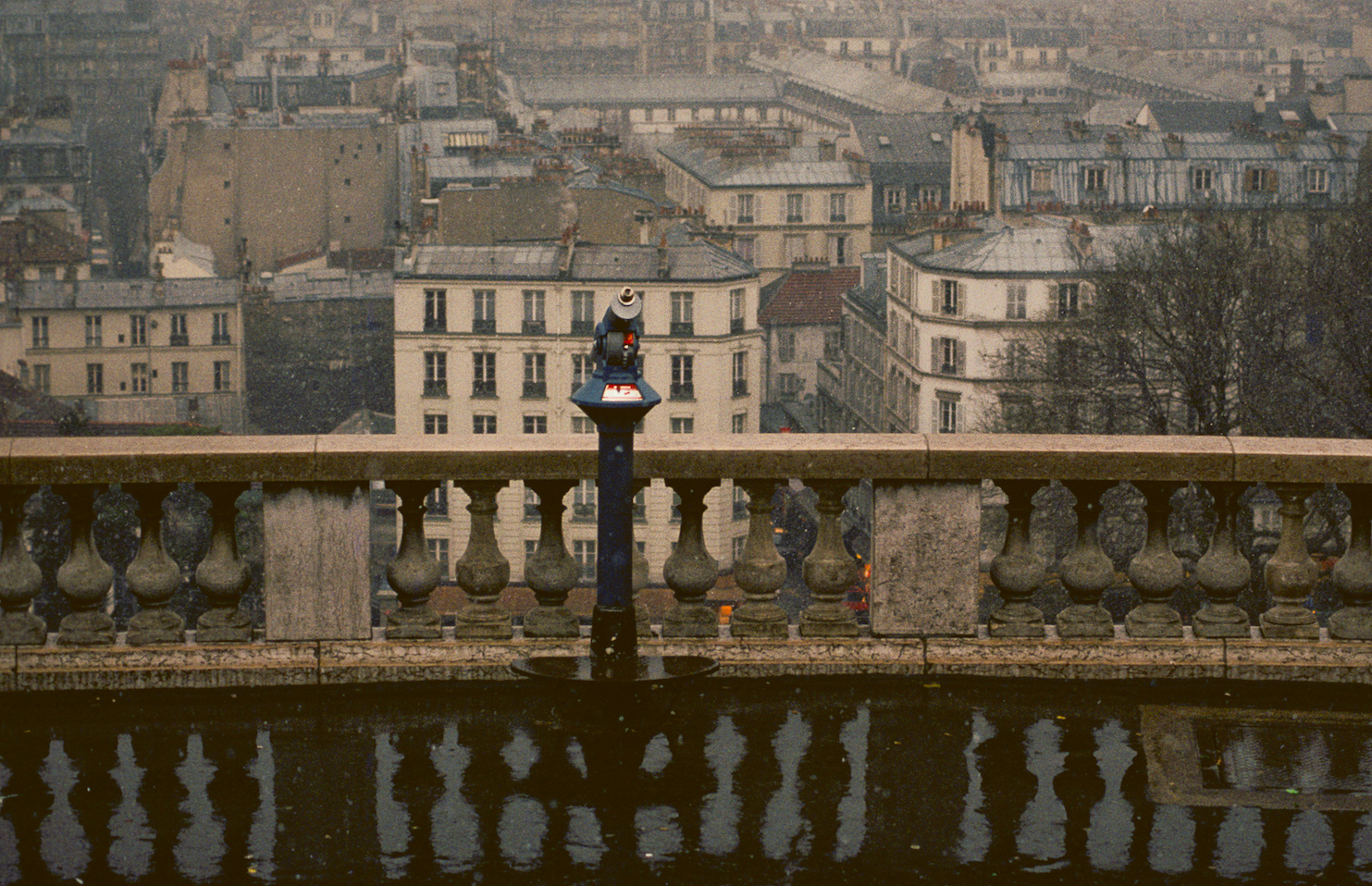 The deserted platform in front of the Sacré Coeur in Montmartre on a rainy day in winter.