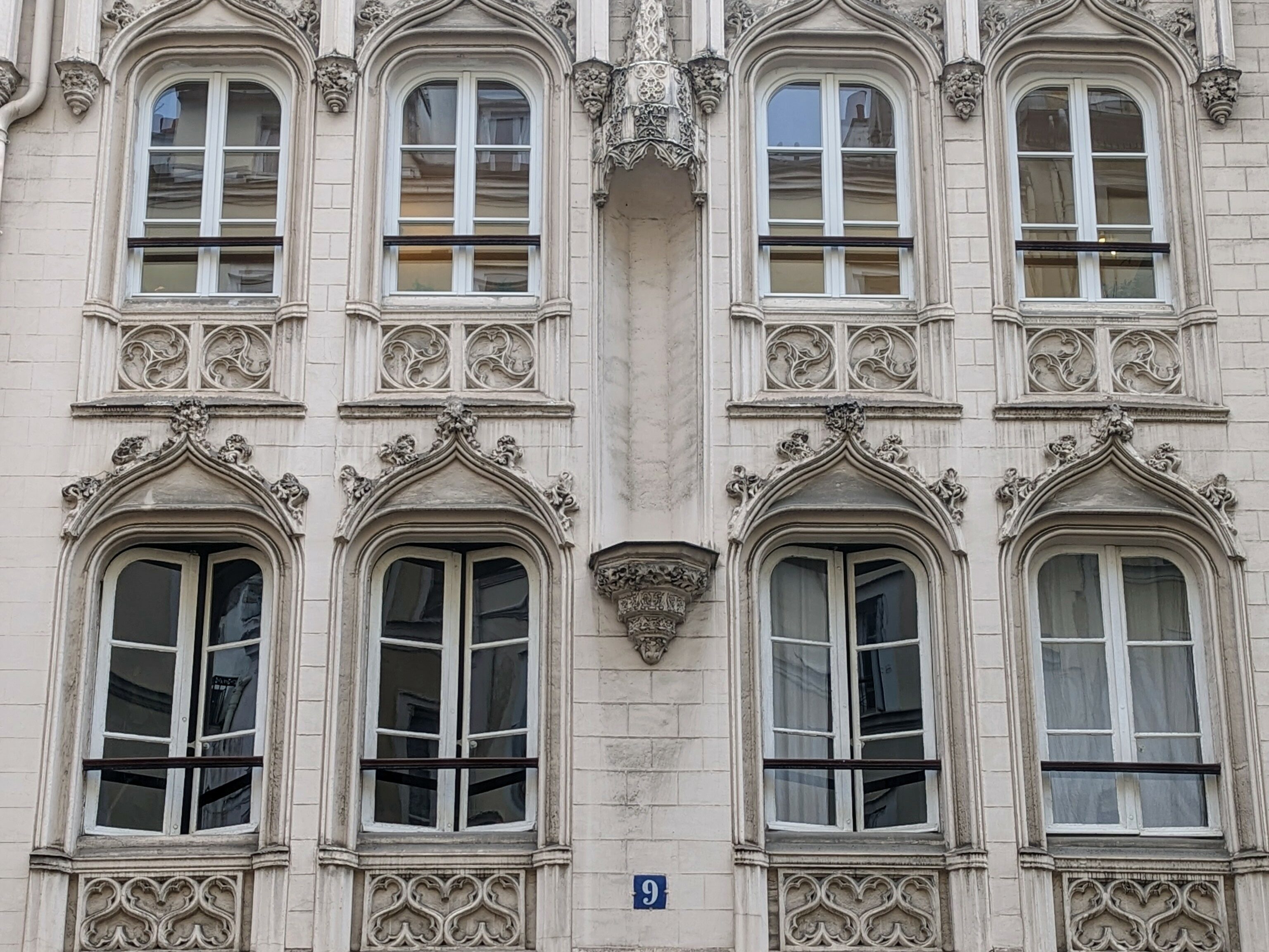 The neo-gothic facade of a former brothel in the SoPi area of the 9th arrondissement in Paris.