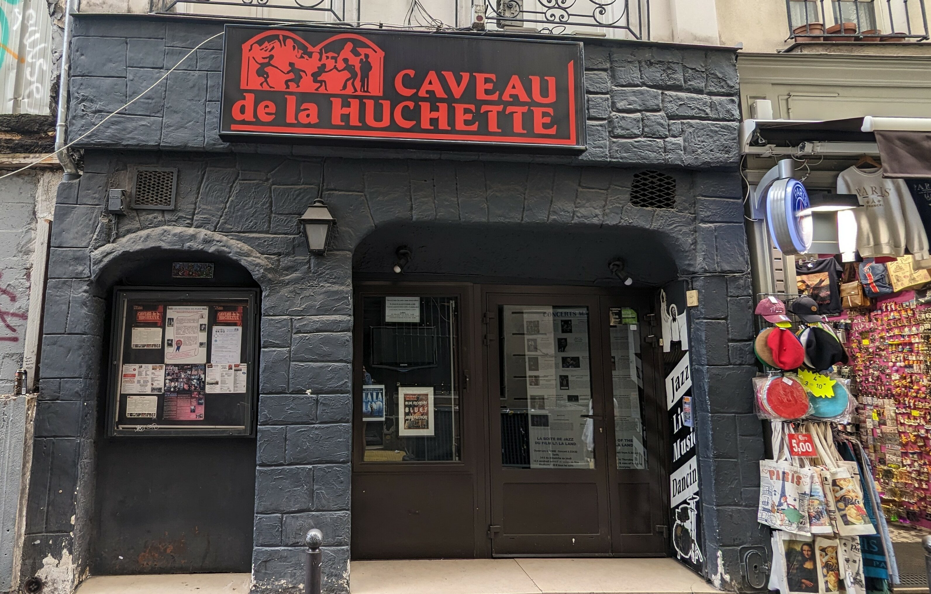 The storefront of the Parisian Jazz Club Caveau de la Huchette, which was featured in La La Land.