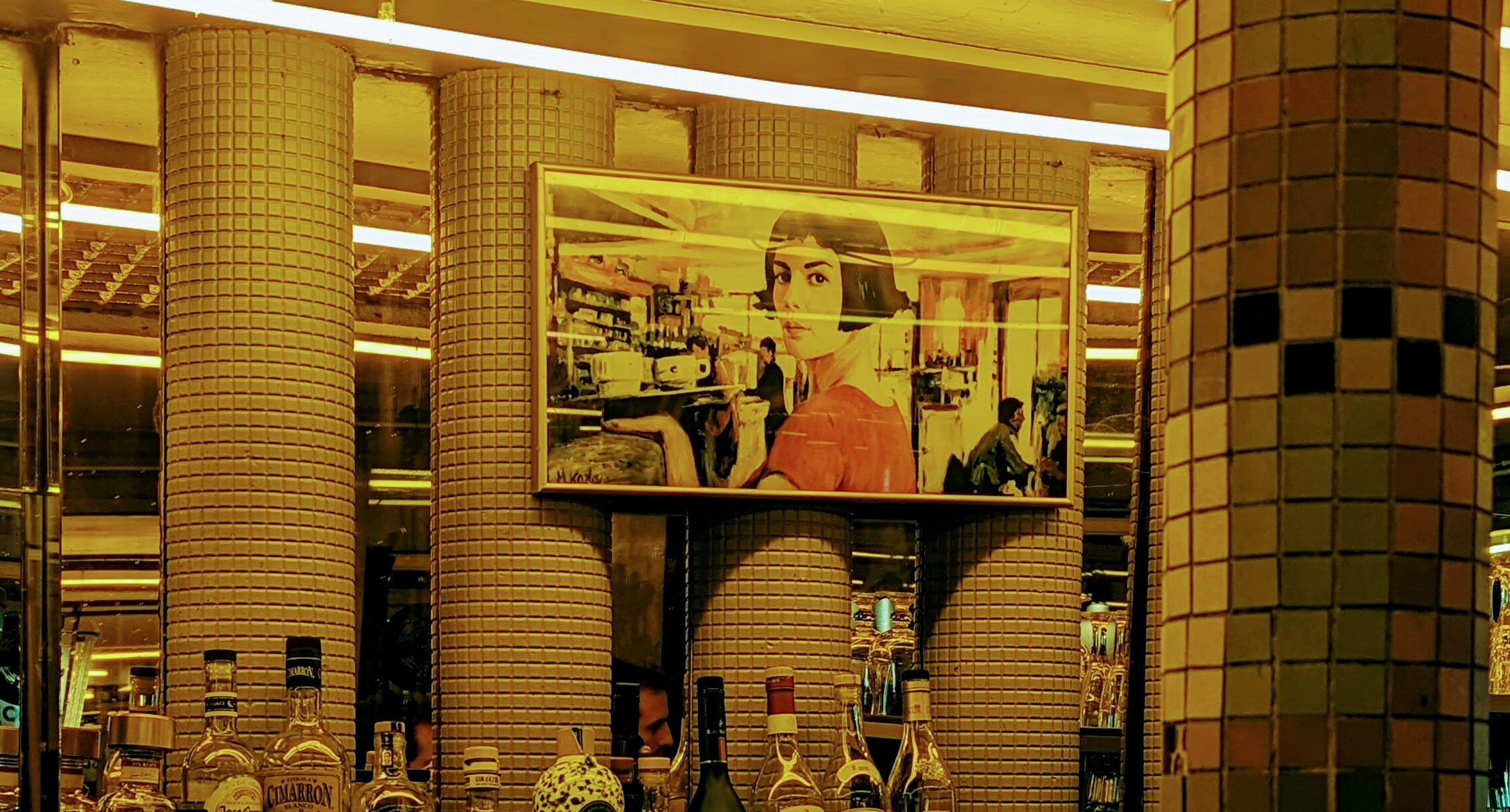A picture of Audrey Tatou in Amelie hangs above the bar of Café des deux Moulins in Paris.