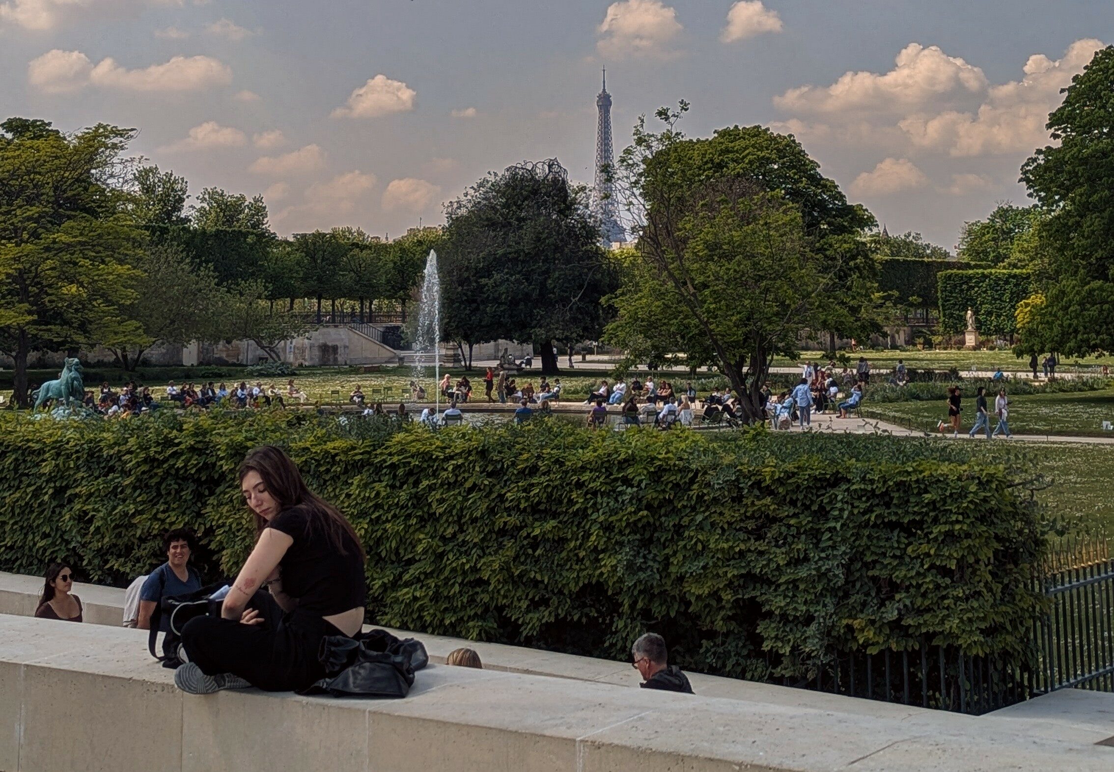 The view on the Tuileries Garden with the Eiffel Tower in the background.