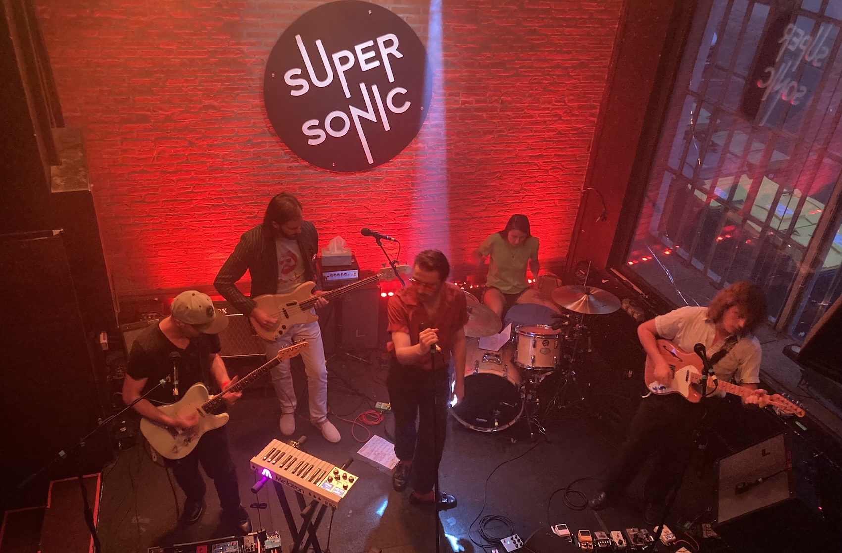 A band playing on stage at Paris' Supersonic club.